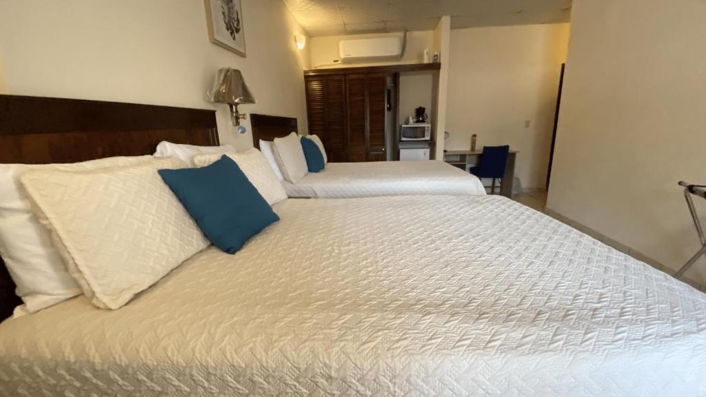 Letto o letti in una camera di Real Guanacaste