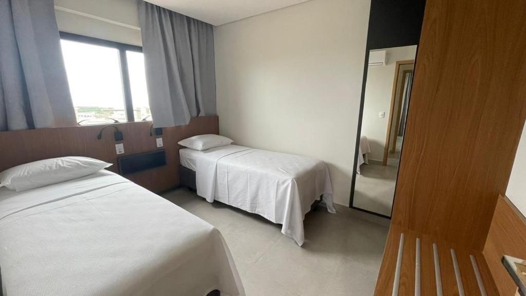 Postel nebo postele na pokoji v ubytování Salinas Premium Resort