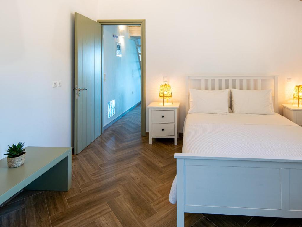 Postel nebo postele na pokoji v ubytování 2Nisi
