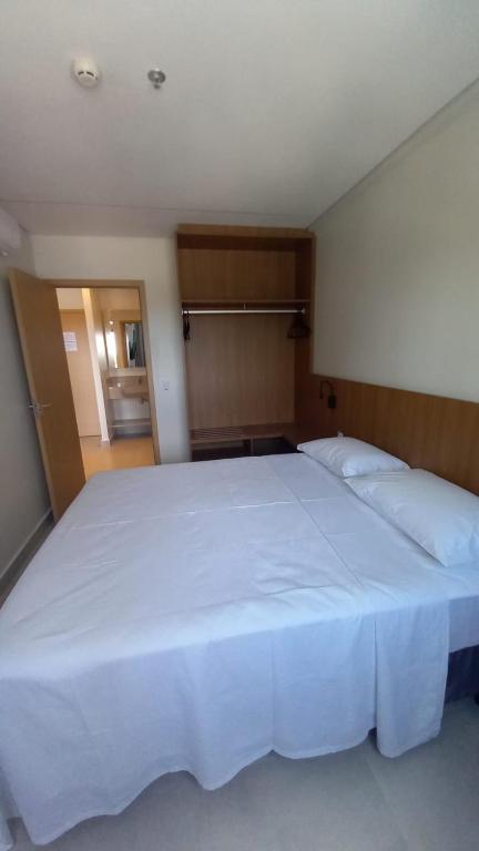 Postel nebo postele na pokoji v ubytování Salinas Premium Resort