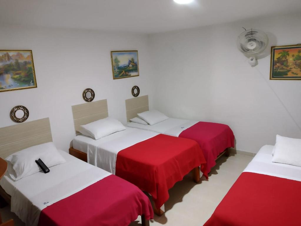 Postel nebo postele na pokoji v ubytování Hotel Mirador Plaza