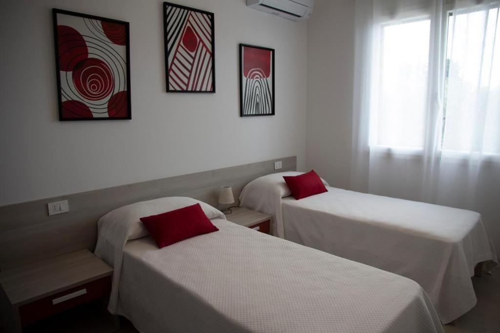 Postel nebo postele na pokoji v ubytování Casa Raineri
