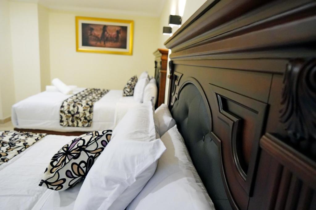 Postel nebo postele na pokoji v ubytování REAL DE LA PEÑA HOTEL 2