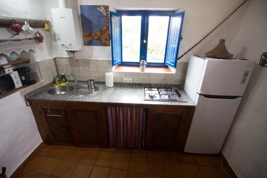 Kuchyňa alebo kuchynka v ubytovaní CASITA ESPERANZA