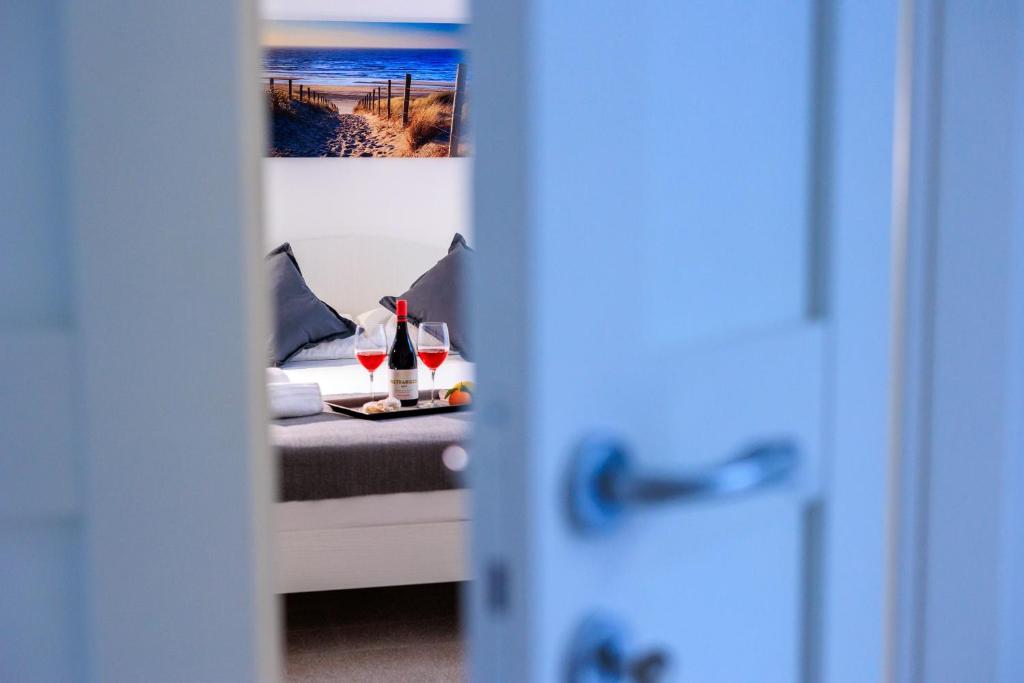 Postel nebo postele na pokoji v ubytování Miramare rooms b&b