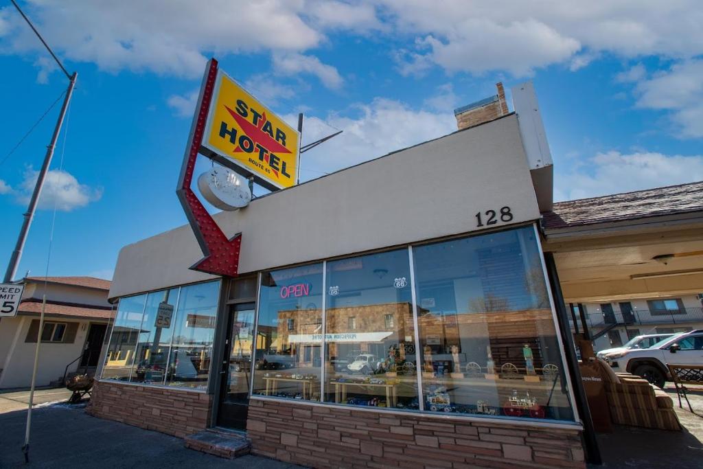 a fast food restaurant with a sign on top of it at Star Route 66 Grand Canyon in Williams