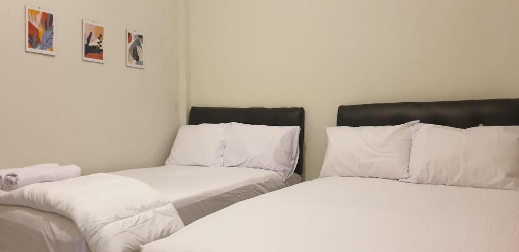 Postel nebo postele na pokoji v ubytování Alexandria12 Guest House