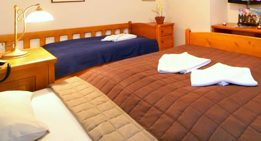 Postel nebo postele na pokoji v ubytování Hotel pizzeria Belmonte