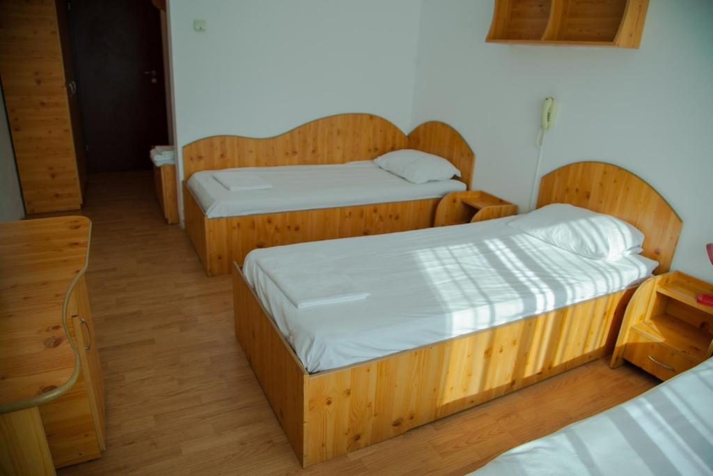 Postel nebo postele na pokoji v ubytování Hotel Vlasca