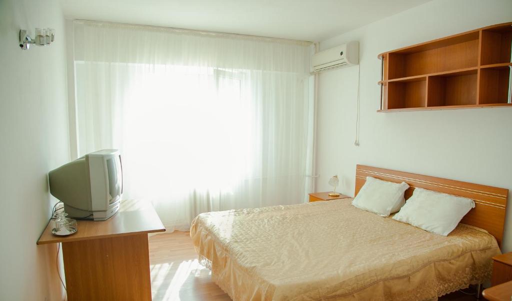 Postel nebo postele na pokoji v ubytování Hotel Vlasca