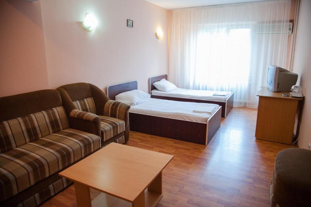 Postel nebo postele na pokoji v ubytování Hotel Vlasca