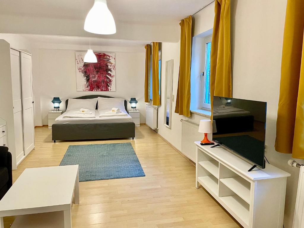 Tempat tidur dalam kamar di ARTAPART - Apartment Top 2 self check-in