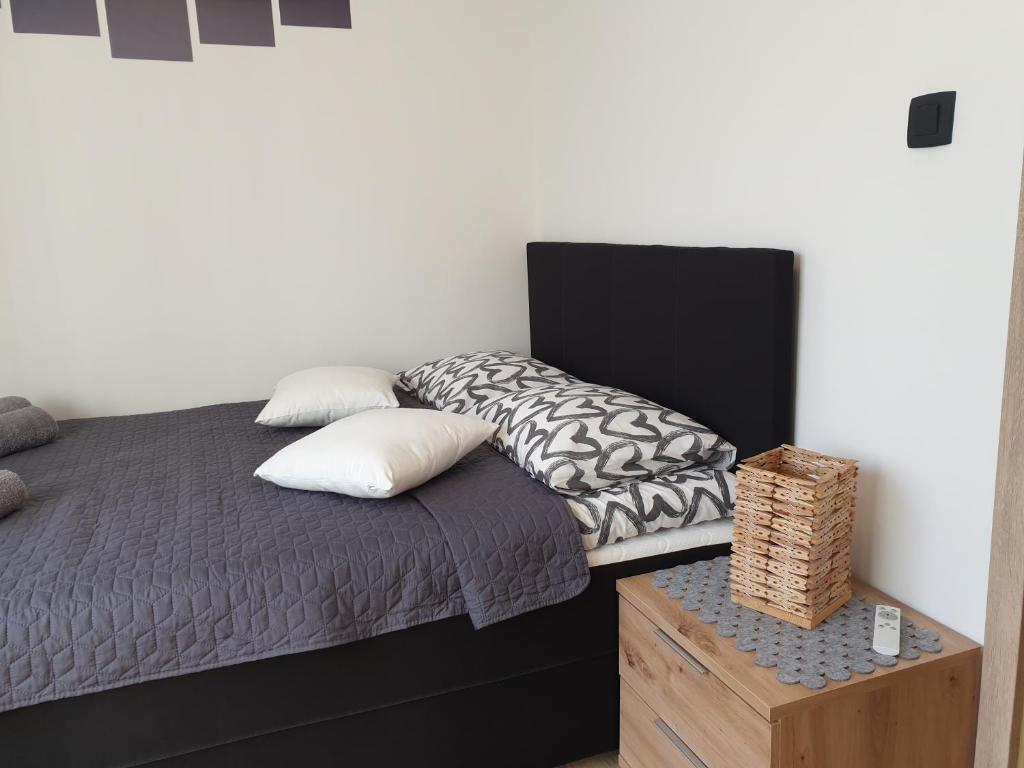 Posteľ alebo postele v izbe v ubytovaní Apartman Anabella