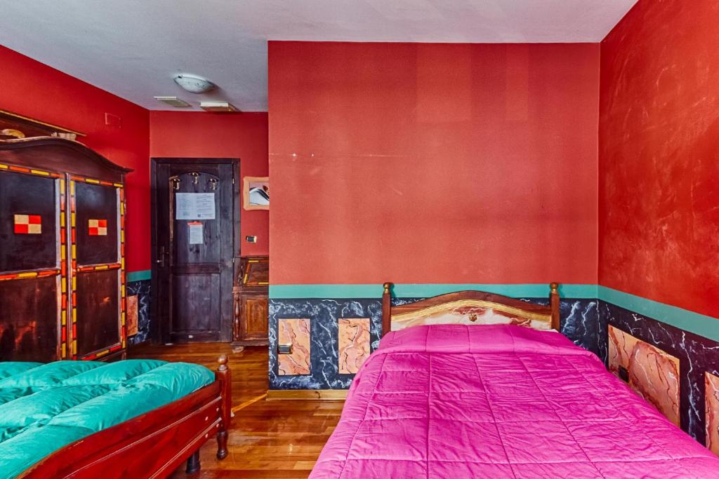 Postel nebo postele na pokoji v ubytování Hotel Portacavana