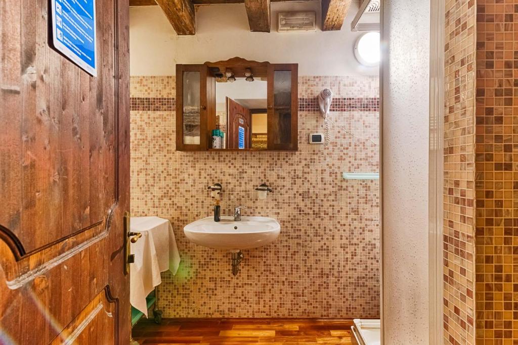Koupelna v ubytování Hotel Portacavana
