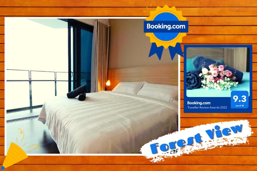 een poster van een slaapkamer met een bed en een raam bij Almas Suites 2 Queen Size Beds Puteri Harbour in Nusajaya