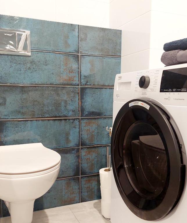 Kúpeľňa v ubytovaní Aura Apartament