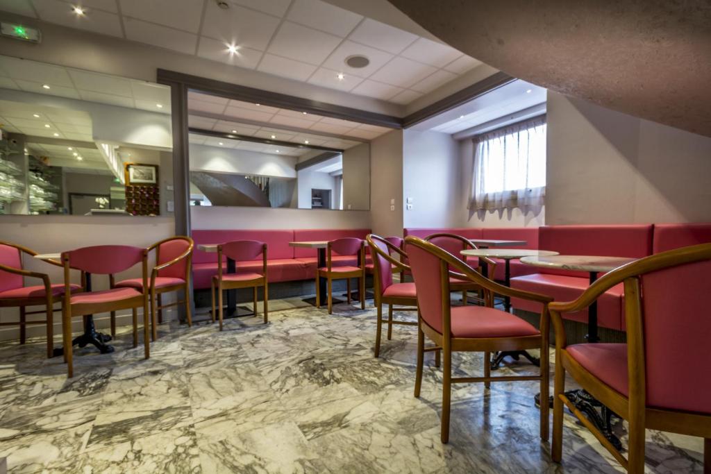 Posezení v ubytování Au Primerose Hôtel