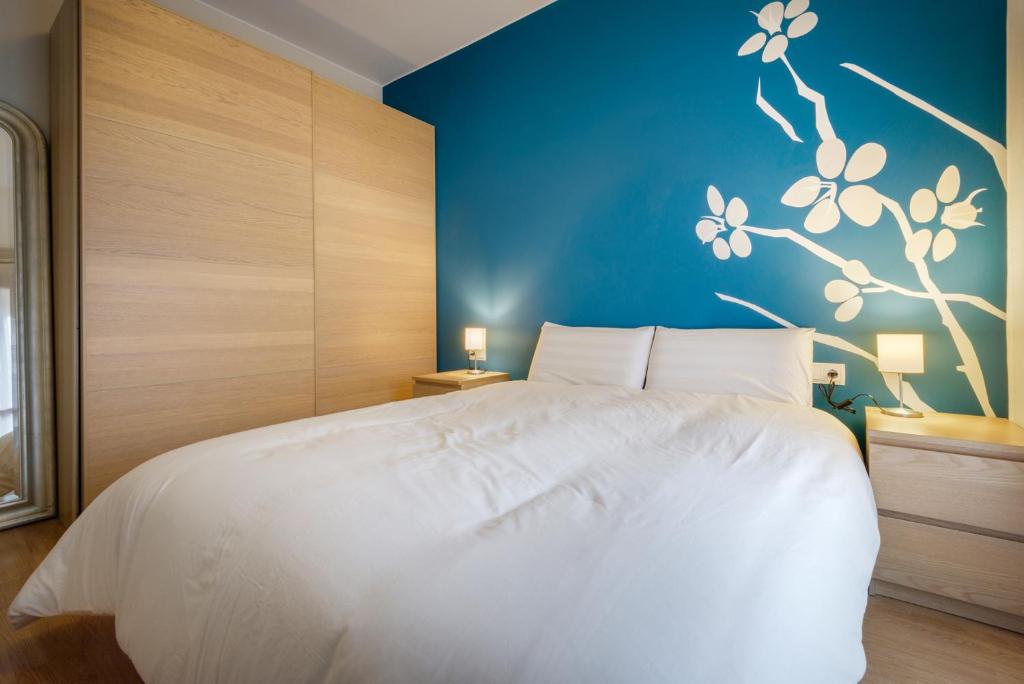 Postel nebo postele na pokoji v ubytování CASA CON JARDIN EN HECHO