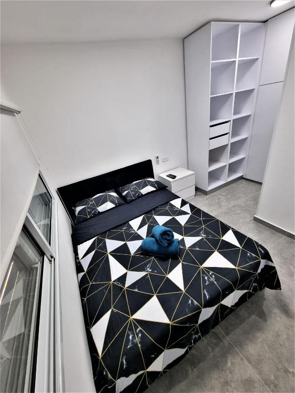 Postel nebo postele na pokoji v ubytování Diamond Suites Eilat