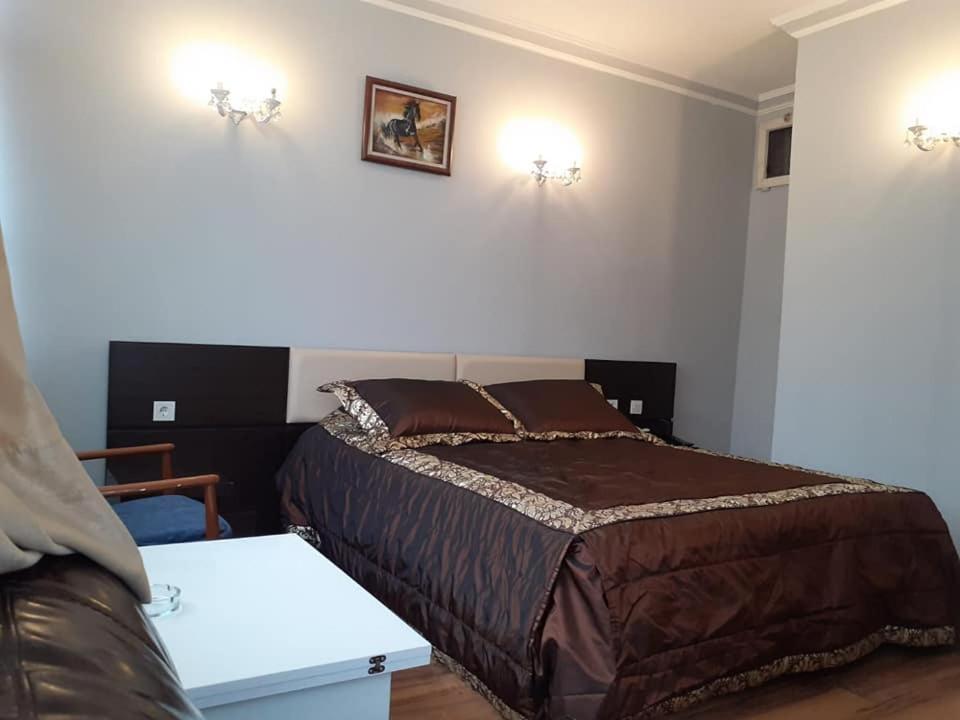 Postel nebo postele na pokoji v ubytování Tac Hotel