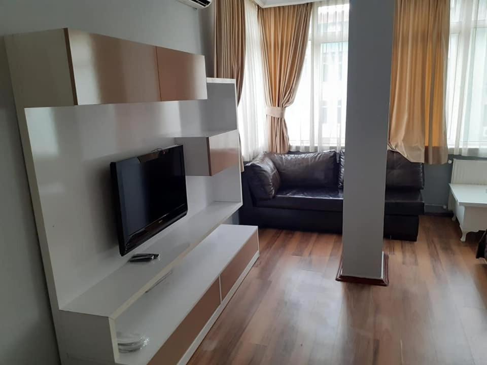 TV a/nebo společenská místnost v ubytování Tac Hotel