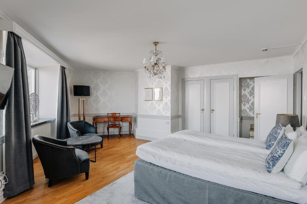 Postel nebo postele na pokoji v ubytování Hotel Gyllene Uttern