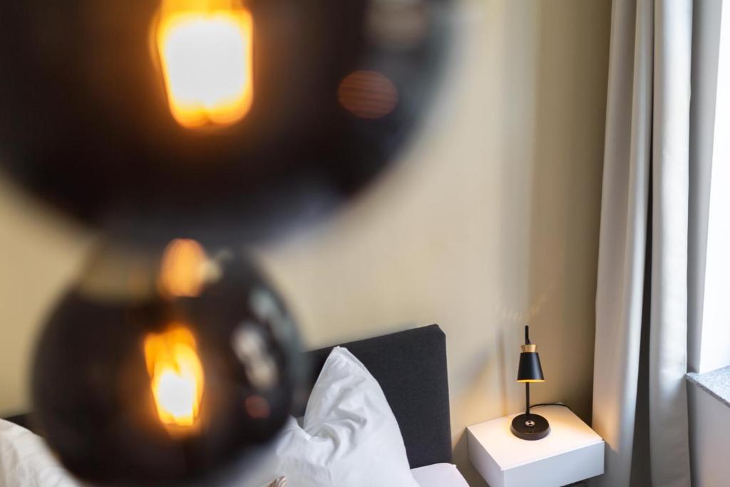Postel nebo postele na pokoji v ubytování Bheaven I Jugendstil Premium Apartment