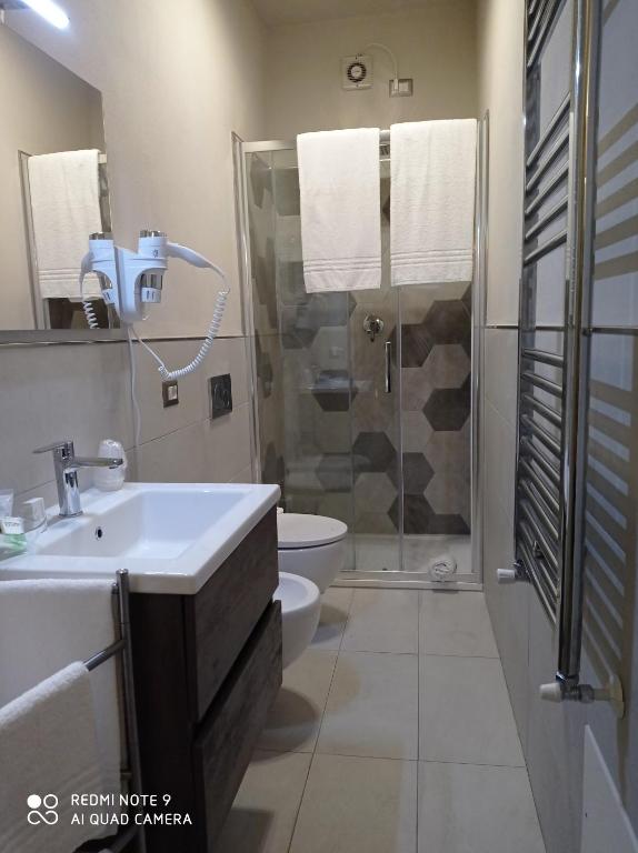 Koupelna v ubytování Hotel Monti