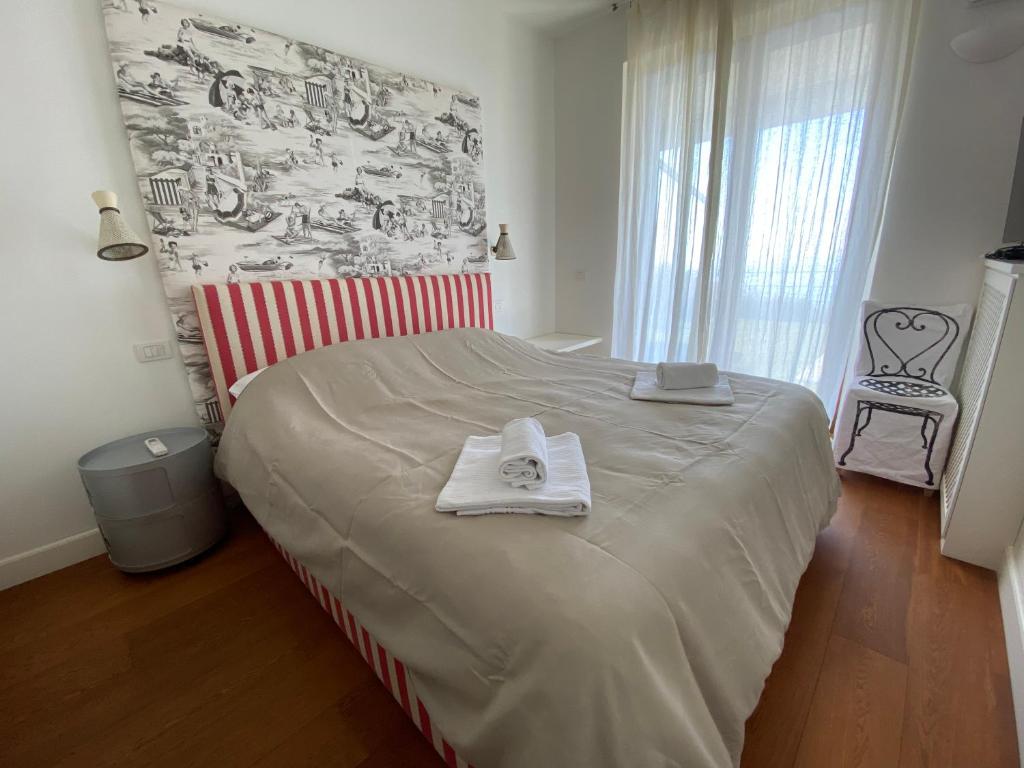 Posteľ alebo postele v izbe v ubytovaní Casa Mirella, un Gioiello Unico
