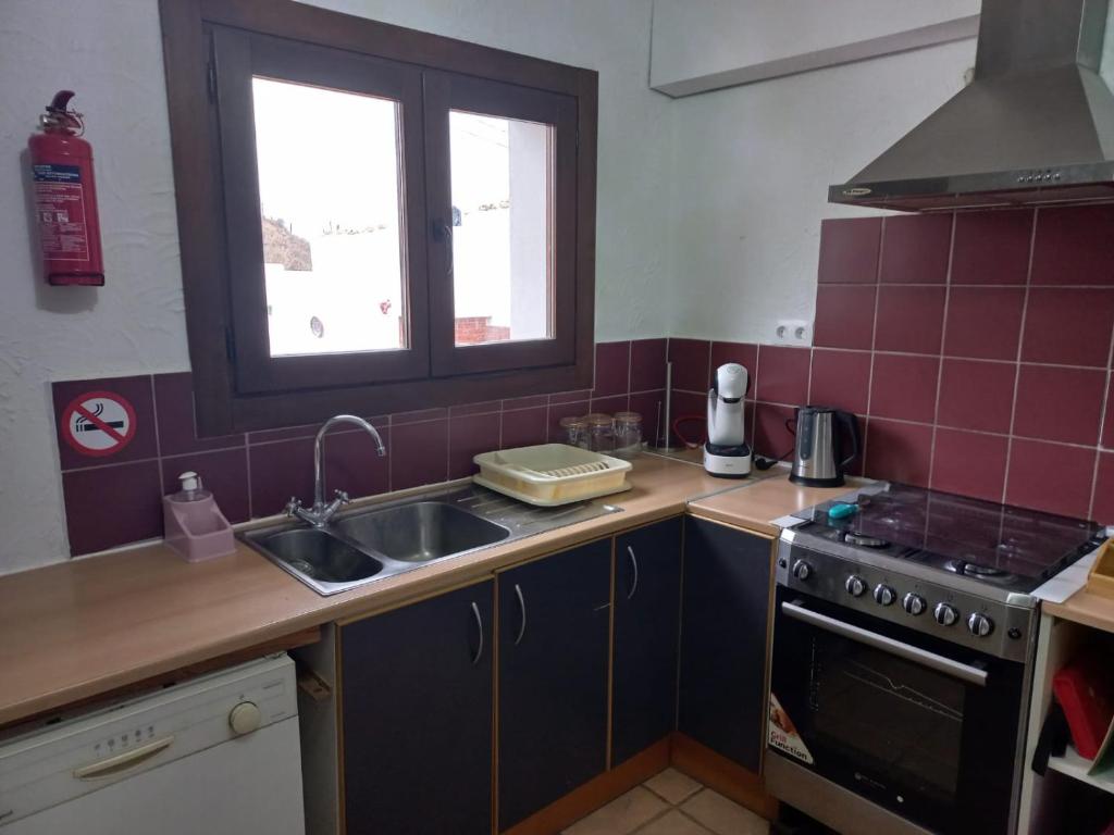 Kuchyň nebo kuchyňský kout v ubytování Cuevas Barrio Las Santas
