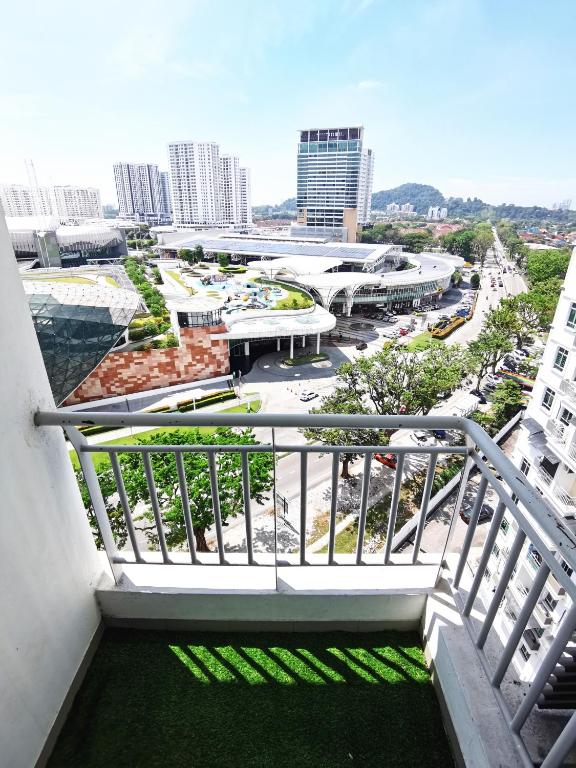 a view of a city from the balcony of a building at TuR11-Oppesite Pisa Stadium-1min-FoodCourt-MiniMarket in Bayan Lepas