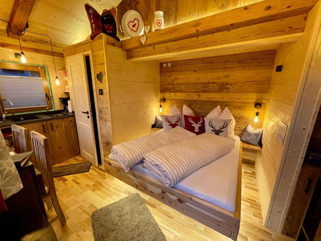 Postelja oz. postelje v sobi nastanitve Tiny House Singer - contactless check-in - Sauna