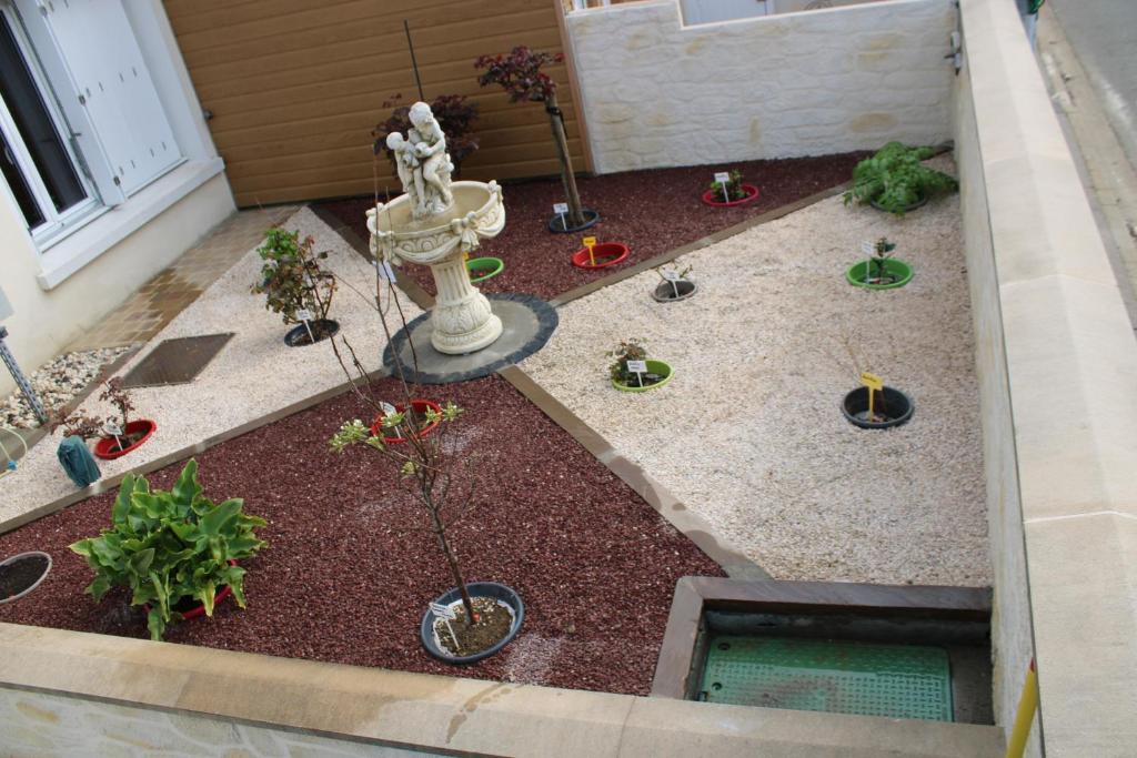 Jardin de l'établissement L'Escale, chambres chez l'habitant