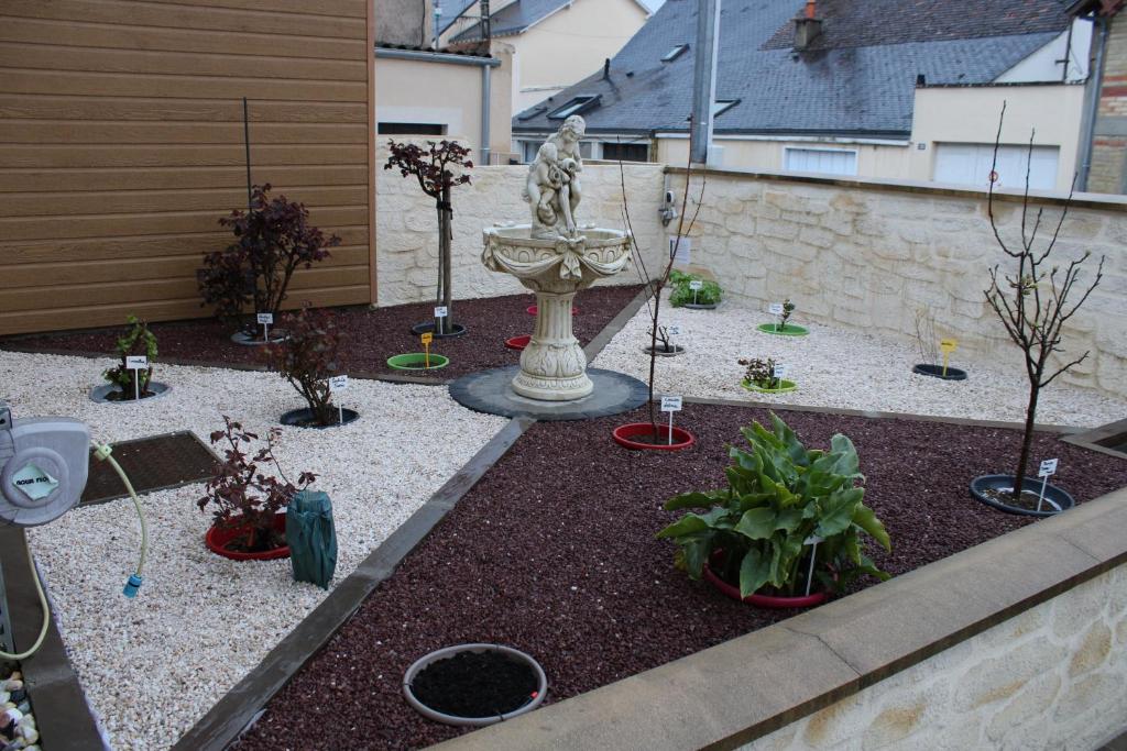Jardin de l'établissement L'Escale, chambres chez l'habitant