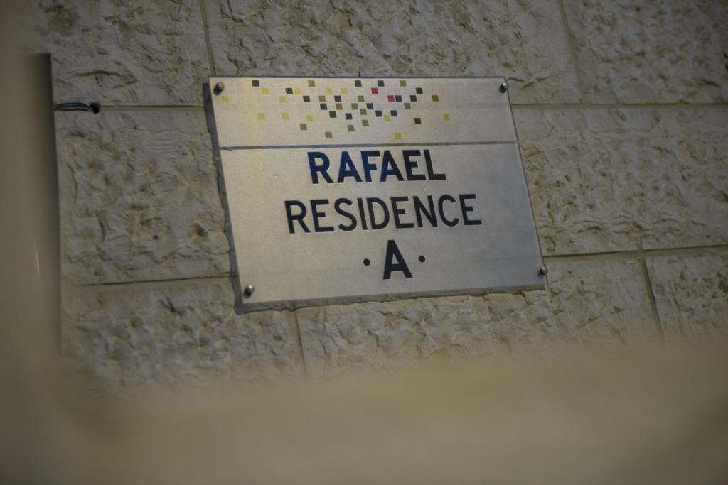 Certifikát, hodnocení, plakát nebo jiný dokument vystavený v ubytování Rafael Residence Boutique