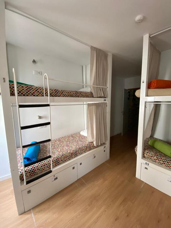 Postel nebo postele na pokoji v ubytování Hostel Eleven