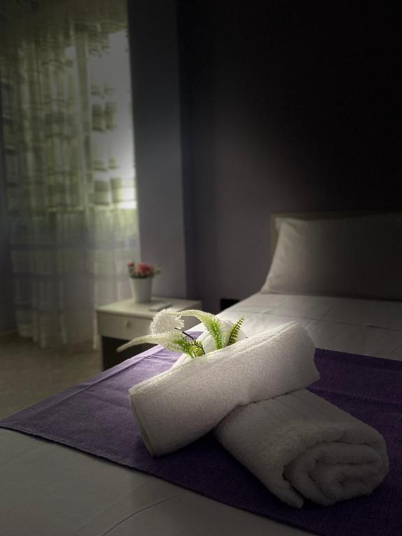 A bed or beds in a room at Casa Mary