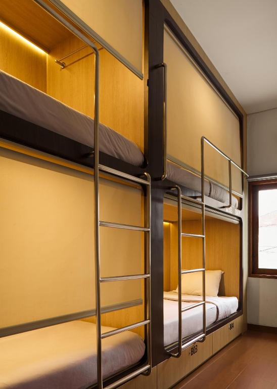 Postel nebo postele na pokoji v ubytování Kamala House
