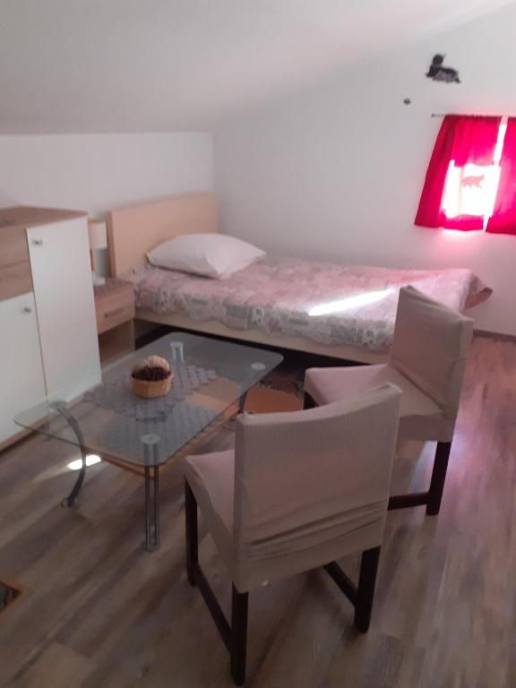 Postel nebo postele na pokoji v ubytování IVA apartments