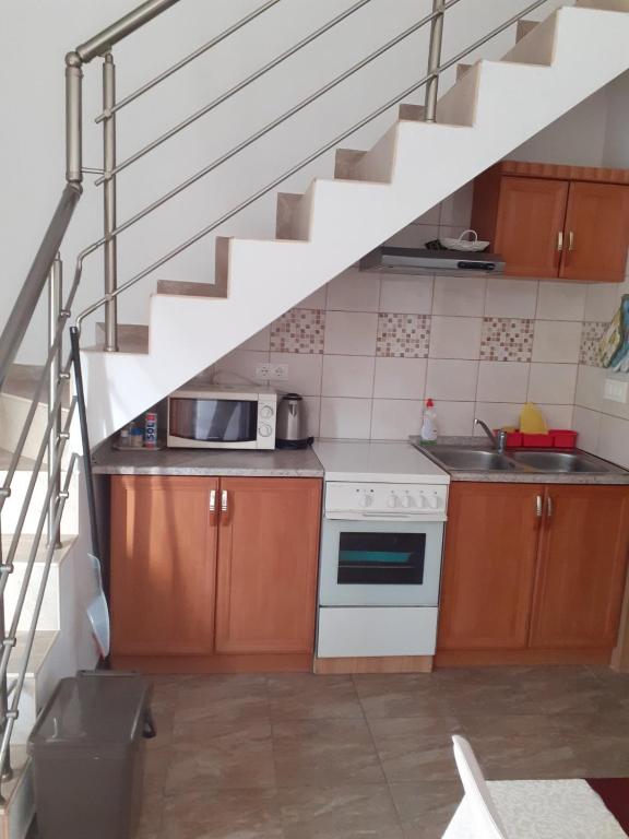 Kuchyň nebo kuchyňský kout v ubytování IVA apartments