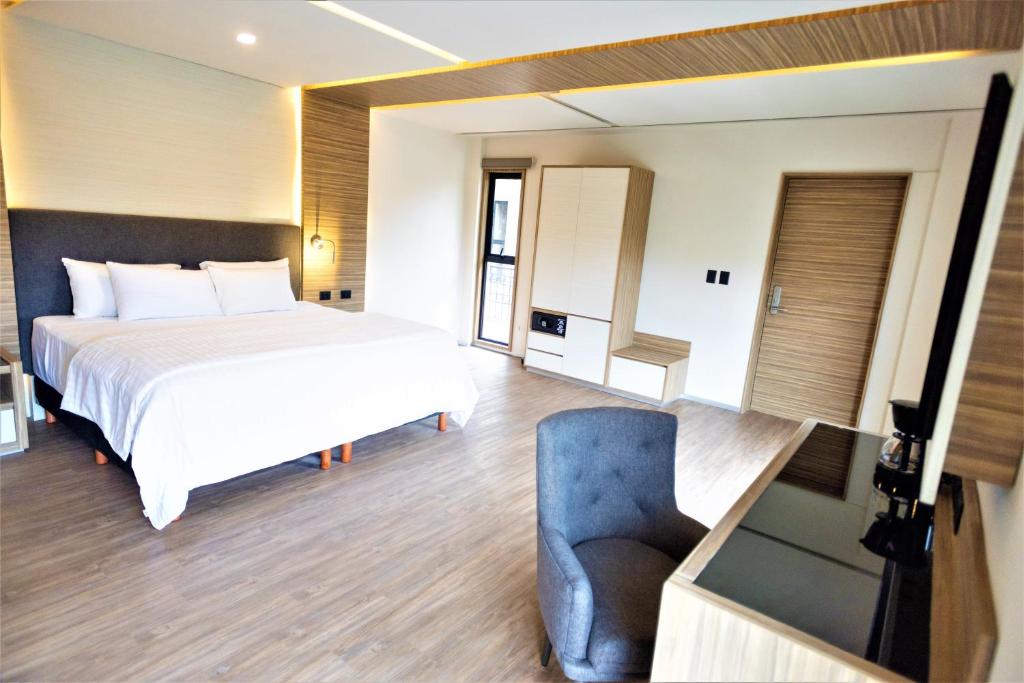 Postel nebo postele na pokoji v ubytování Hotel Plaza by Kavia