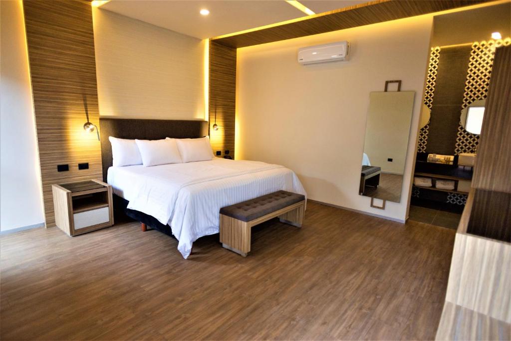 Postel nebo postele na pokoji v ubytování Hotel Plaza by Kavia
