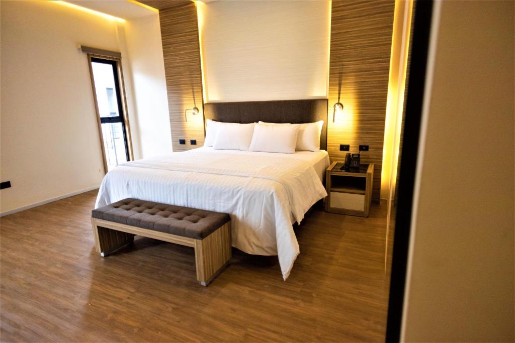 Postel nebo postele na pokoji v ubytování Hotel Plaza by Kavia