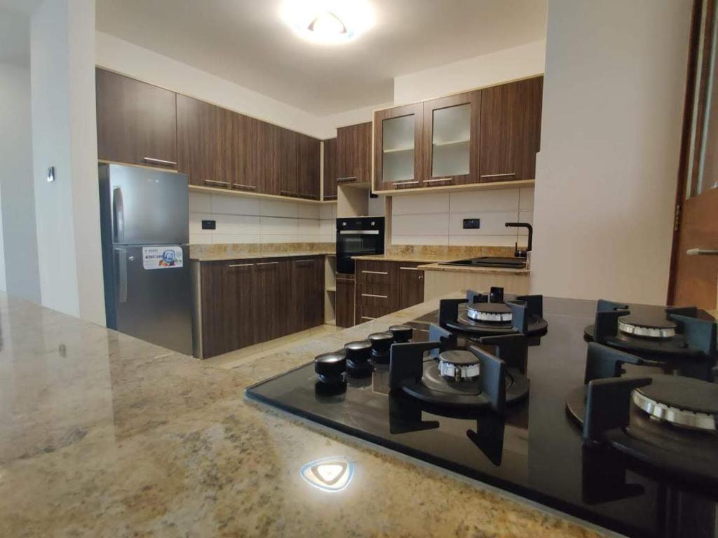 Kuchyň nebo kuchyňský kout v ubytování English Point Residence Beach Apartments Mombasa