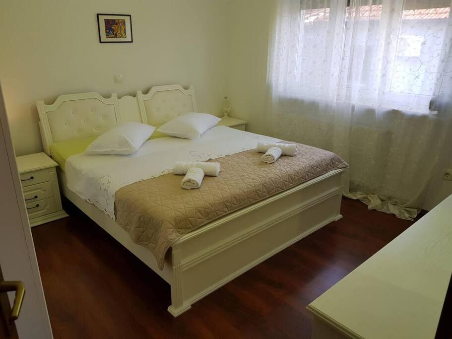 Posteľ alebo postele v izbe v ubytovaní Kuća ILIRIA