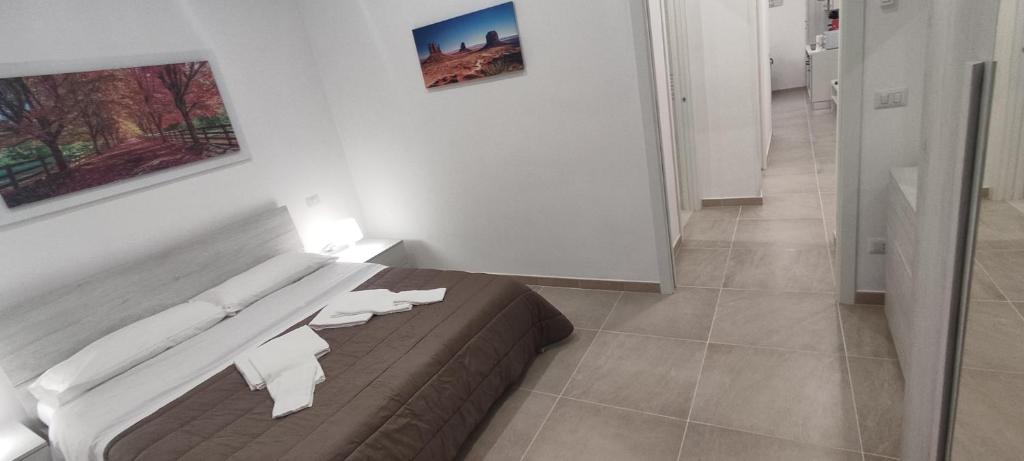 Postel nebo postele na pokoji v ubytování InBlu
