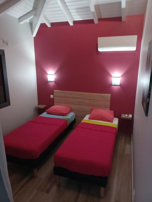 Letto o letti in una camera di Les Balcons du Parc