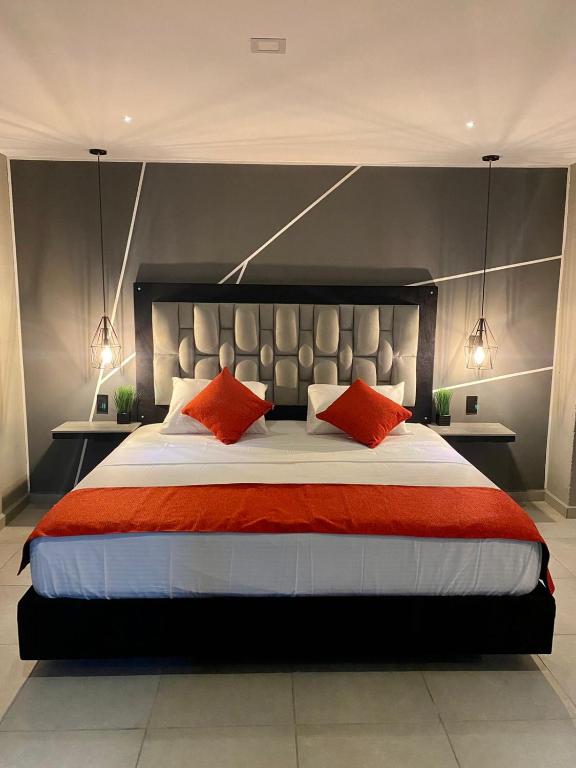 Ένα ή περισσότερα κρεβάτια σε δωμάτιο στο Hotel BRC