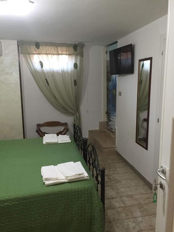 Postel nebo postele na pokoji v ubytování Baccaversa camere
